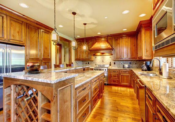 Luxury wood kitchen with granite countertop. Mountain luxury home with wood kitchen and granite countertop.
